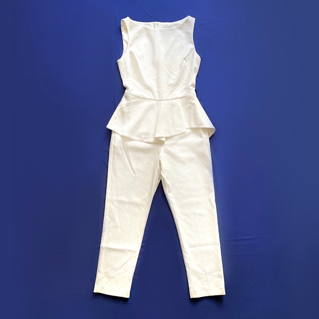 Black Halo Women's Jumpsuit, Sleeveless, With Ruffle. Size 4 Off White Color
